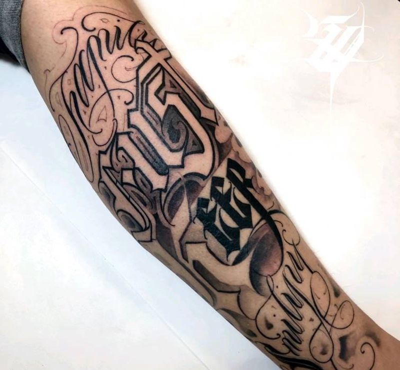 店里纹身师作品纹身图片_腿部花体字纹身图案