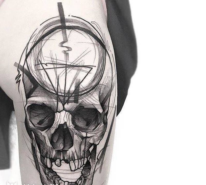 骷髅头纹身图片_腿部纹身图案