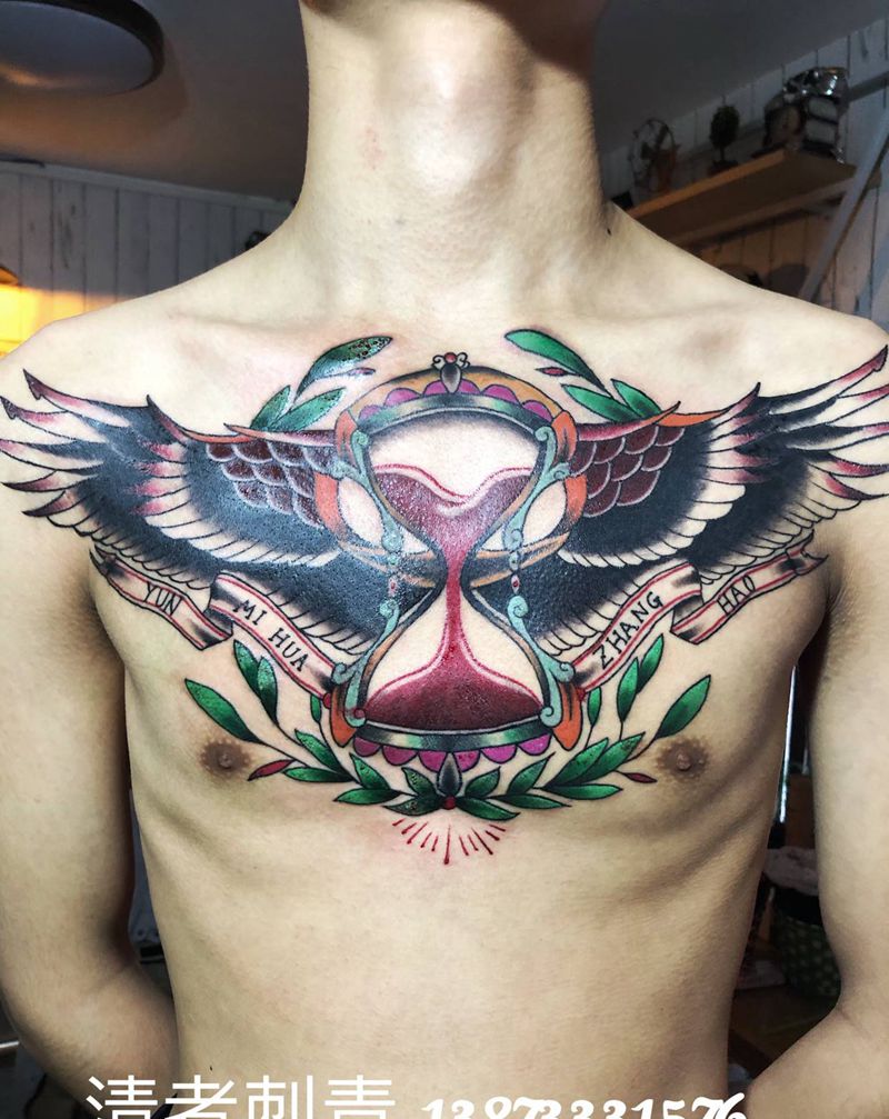 花胸沙漏纹身图片_胸部纹身图案