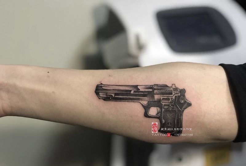 手枪纹身图片