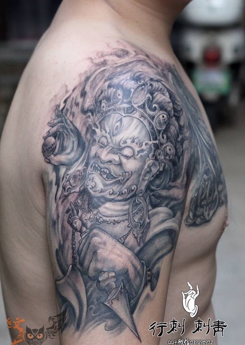 大黑天加半胛纹身图片