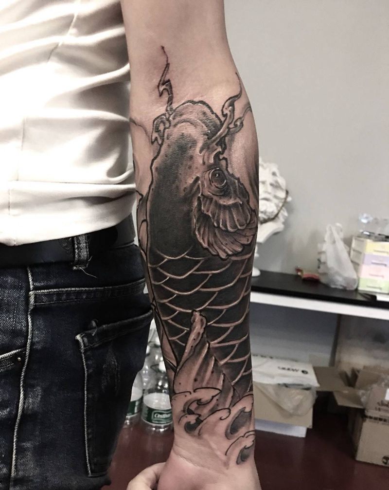 鱼与花包小臂纹身图片