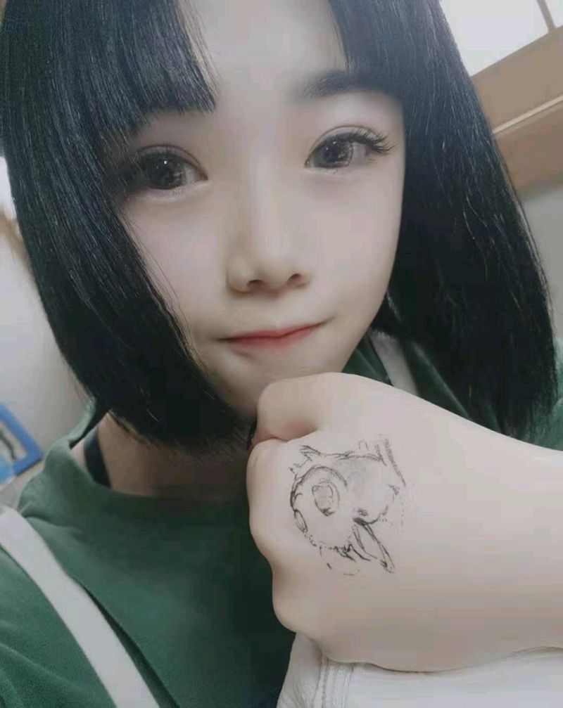 兔子纹身图片_手部纹身图案