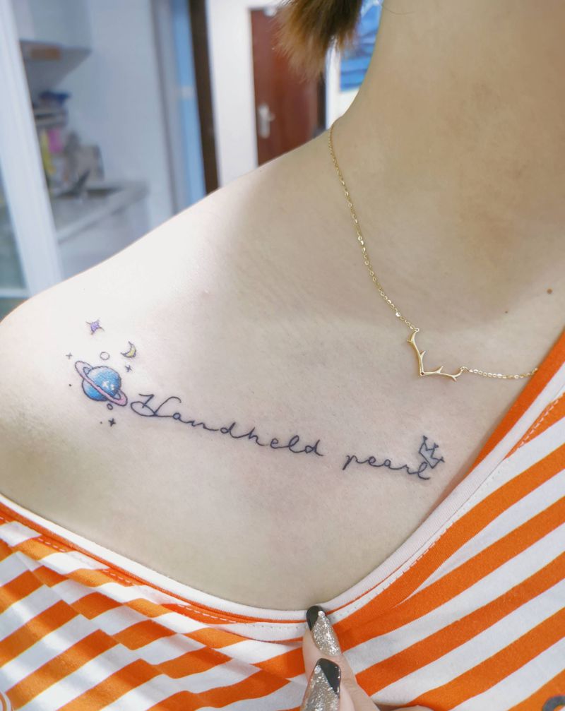 快乐星球纹身图片_肩部纹身图案