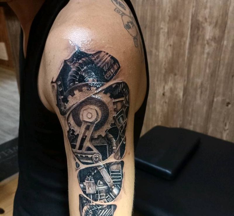 机械小图纹身图片_手臂纹身图案