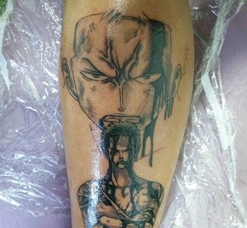 海贼王索隆纹身图片_腿部肖像清新人物成品纹身图案