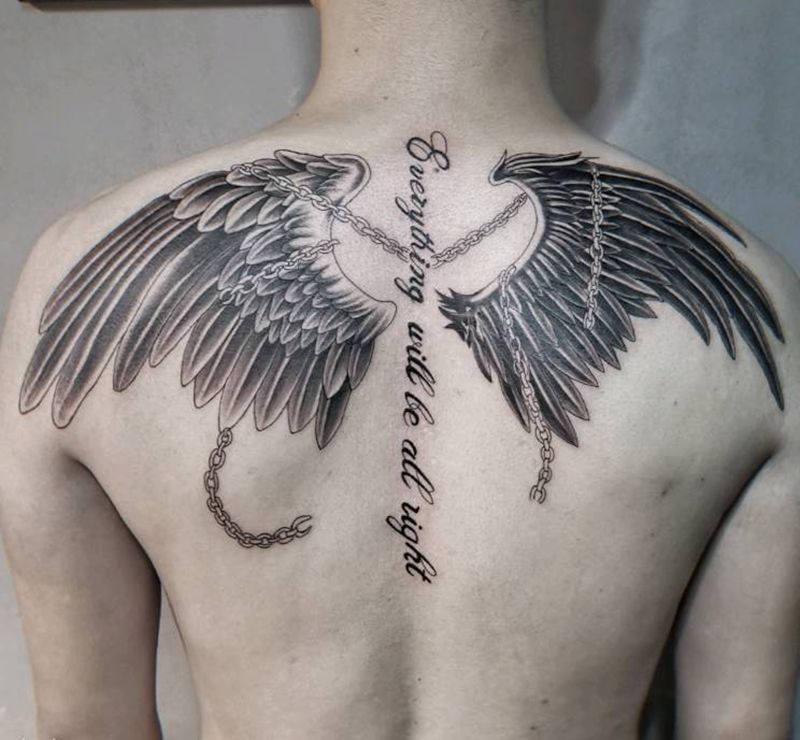 天使恶魔翅膀纹身图片_背部欧美写实纹身图案