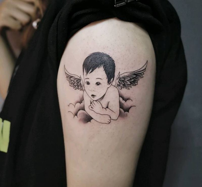 孩子照片纹身图片_手臂纹身图案