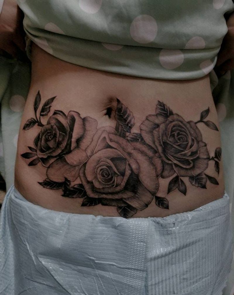 妊辰纹遮盖纹身图片_腹部纹身图案