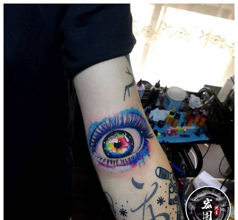水彩眼睛纹身图片_成品手臂欧美人物原创纹身图案