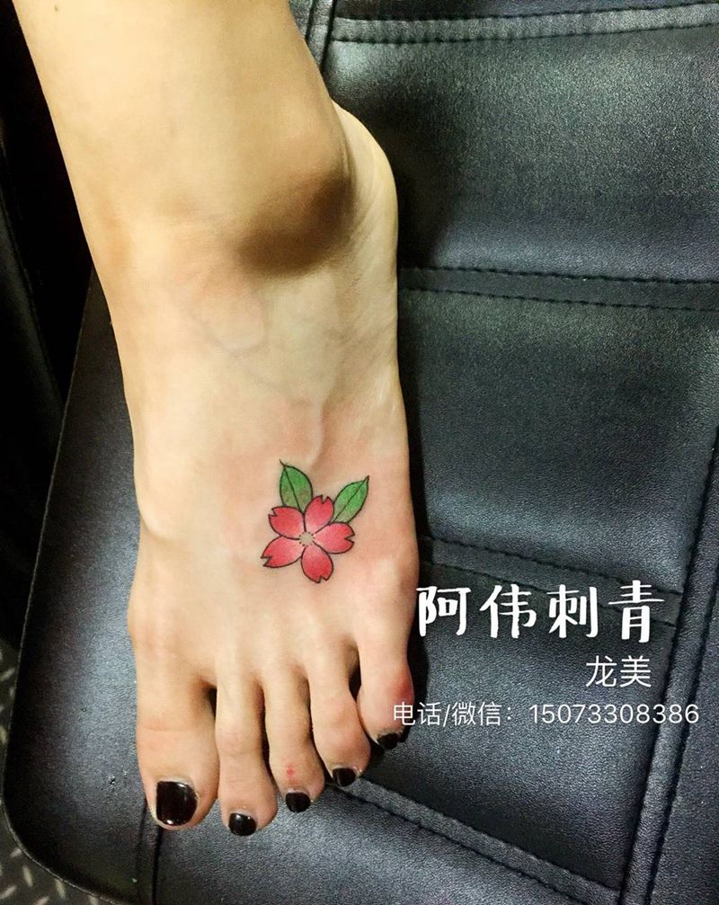 樱花盛开纹身图片_脚部清新植物花纹身图案