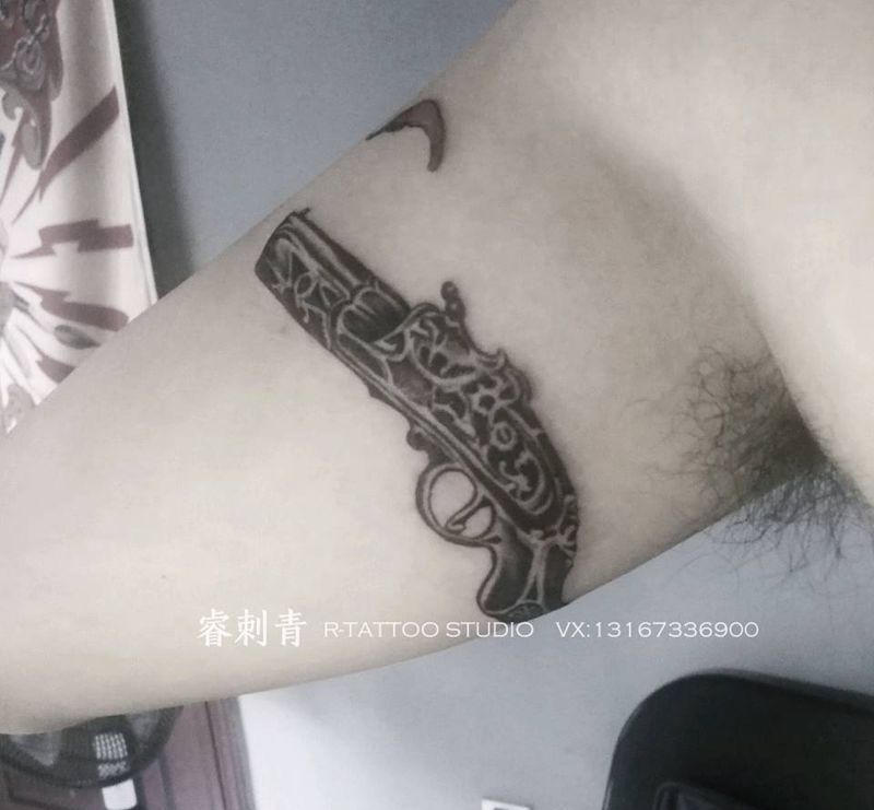 复古火枪纹身图片
