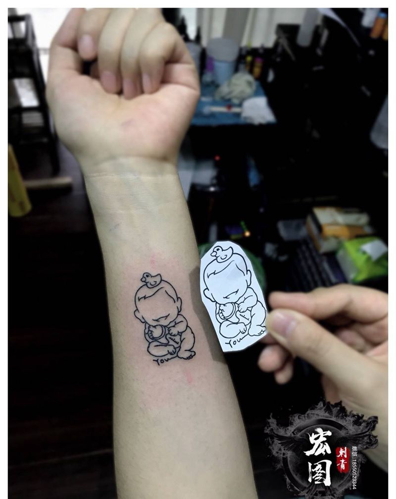 她儿子可爱吧纹身图片_成品手臂清新人物原创纹身图案