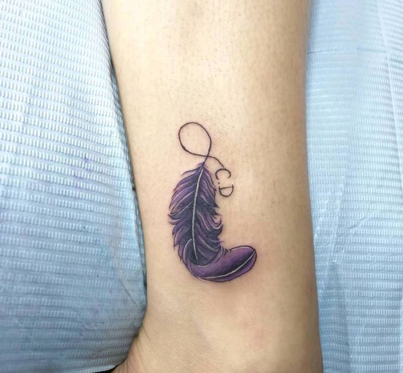 羽毛遮盖旧纹身纹身图片