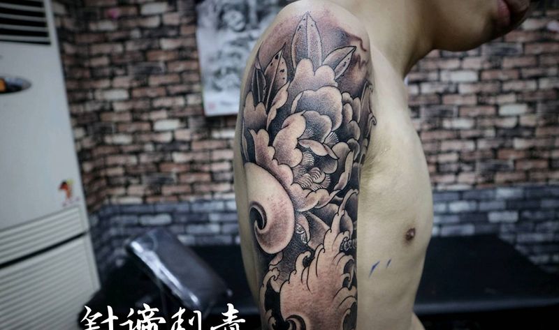 牡丹浪花纹身图片