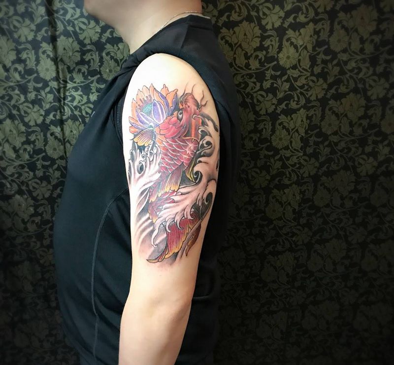 手臂鲤鱼纹身图片_成品手臂传统动物植物静物纹身图案