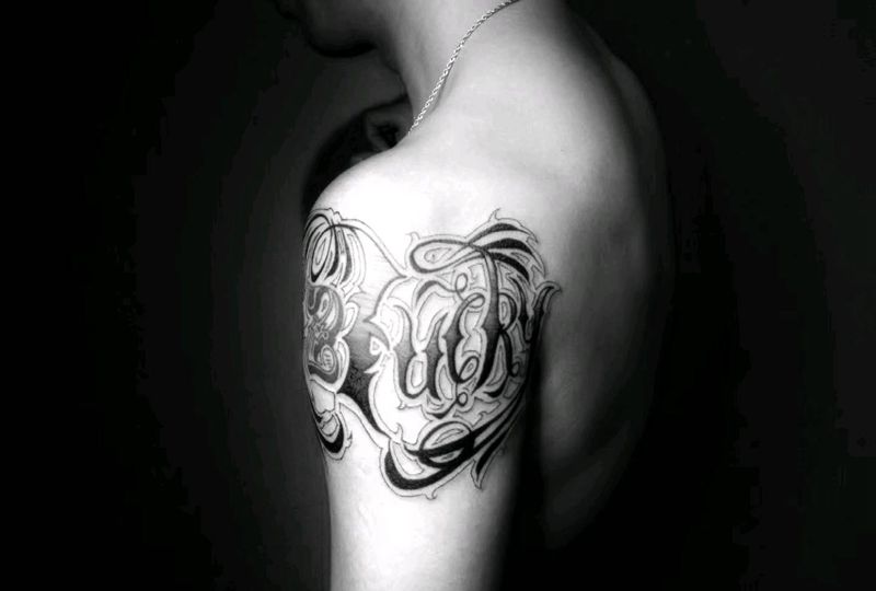 Chicano: lucky纹身图片_手臂花体字纹身图案