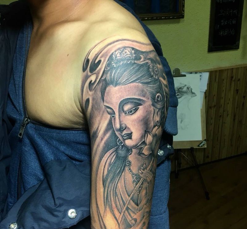 大臂佛像纹身纹身图片