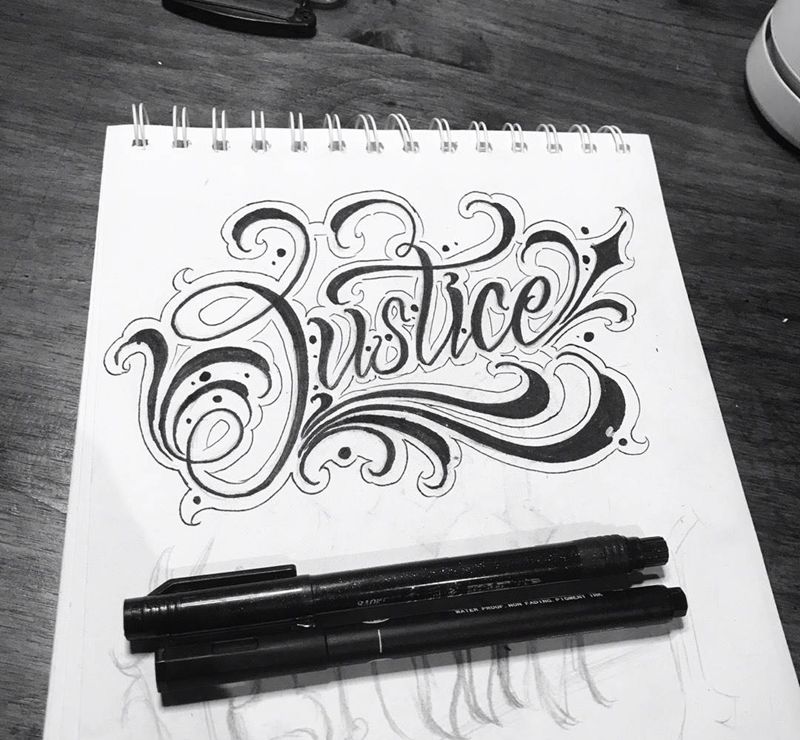 正义纹身图片_花体字纹身图案