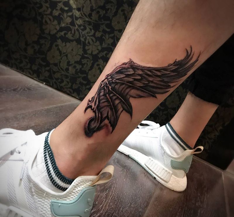 翅膀纹身图片_成品腿部欧美写实动物纹身图案