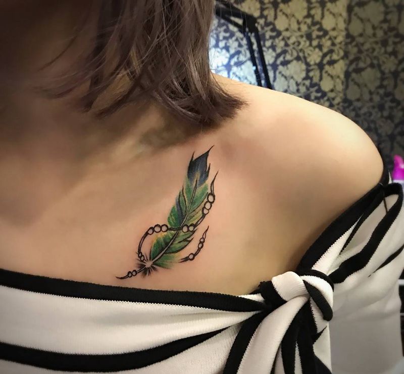 水彩羽毛纹身图片_成品肩部胸部欧美清新静物情侣纹身图案