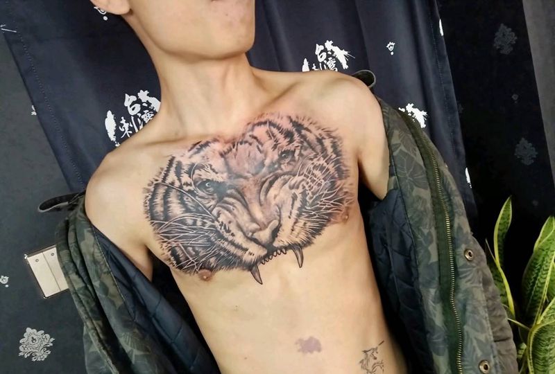 虎头未完纹身图片