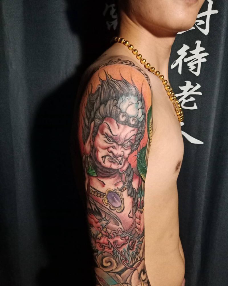 不动明王  七分臂纹身图片_手臂纹身图案