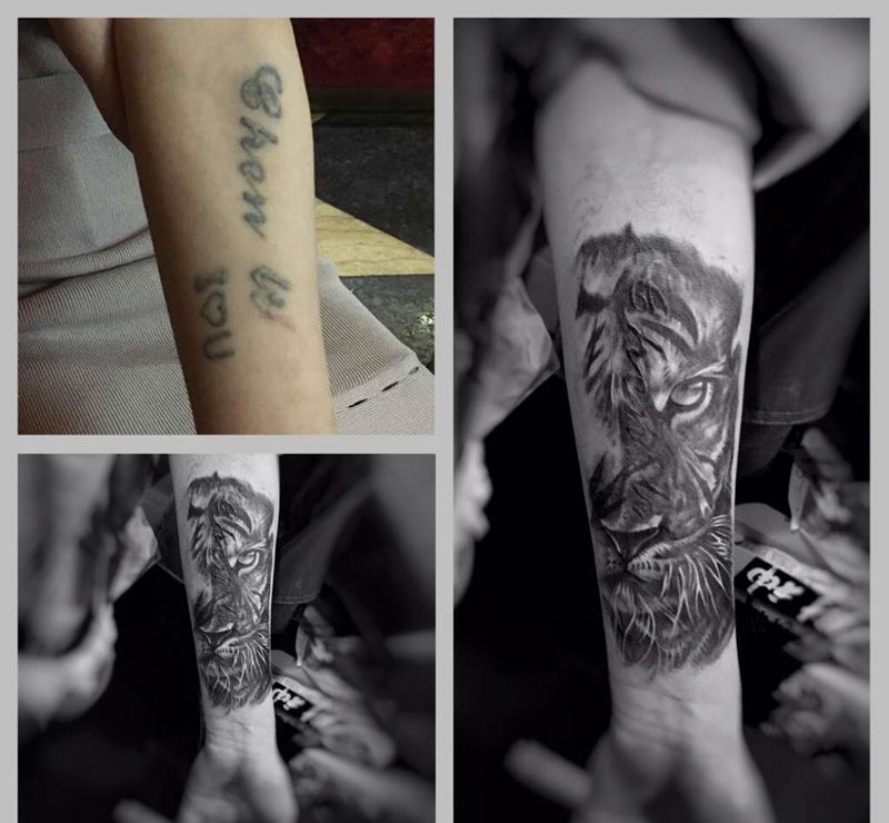 遮盖进行中纹身图片_手臂手部欧美写实动物纹身图案