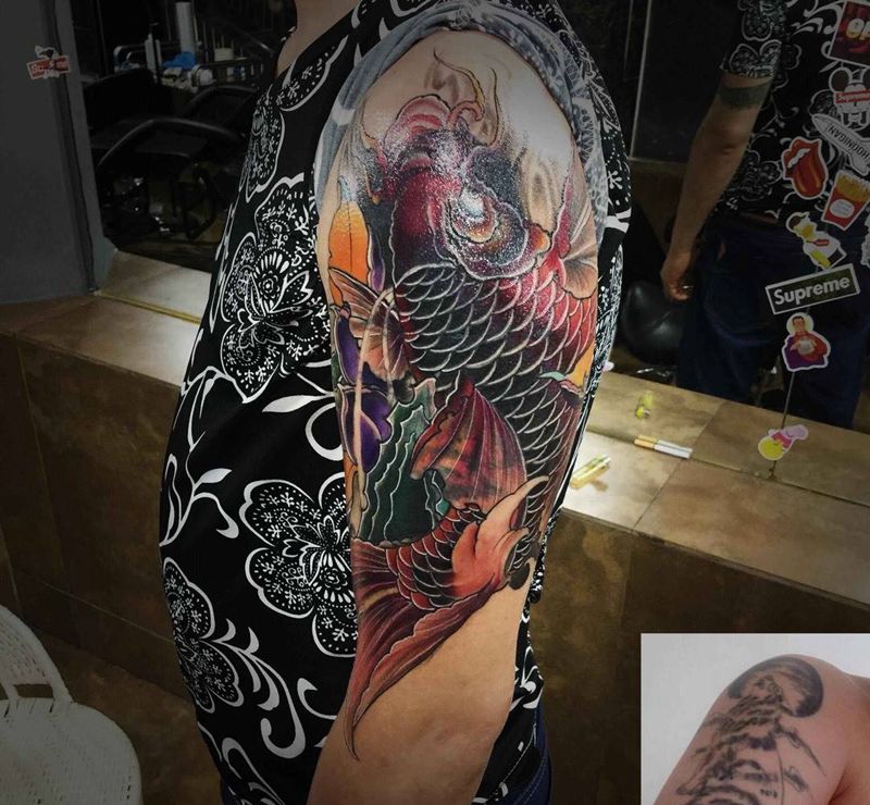 鲤鱼遮盖纹身图片