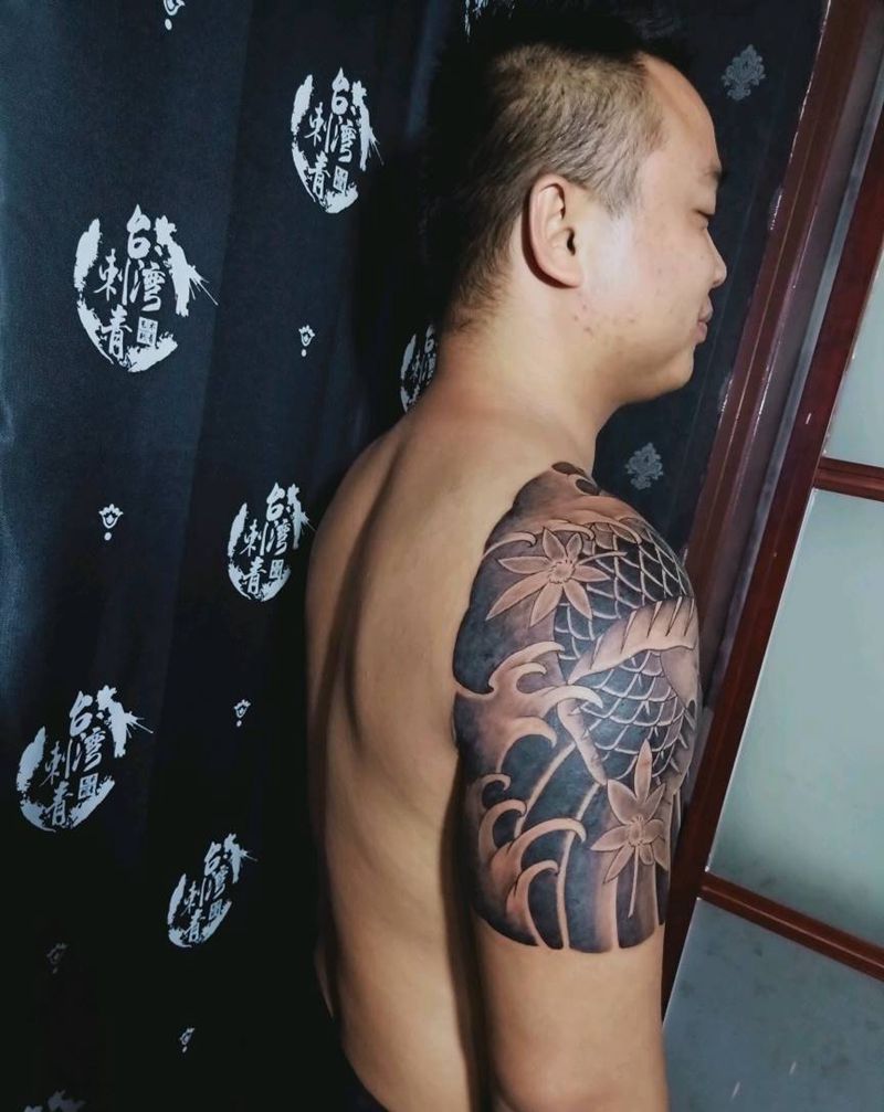 半胛鱼纹身图片_手臂纹身图案