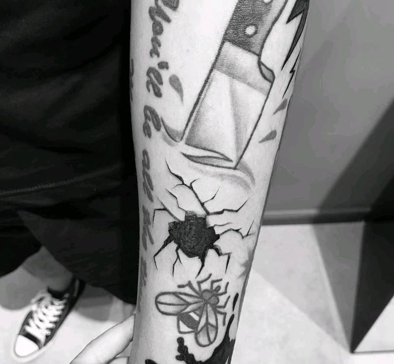 裂痕纹身图片_手臂纹身图案