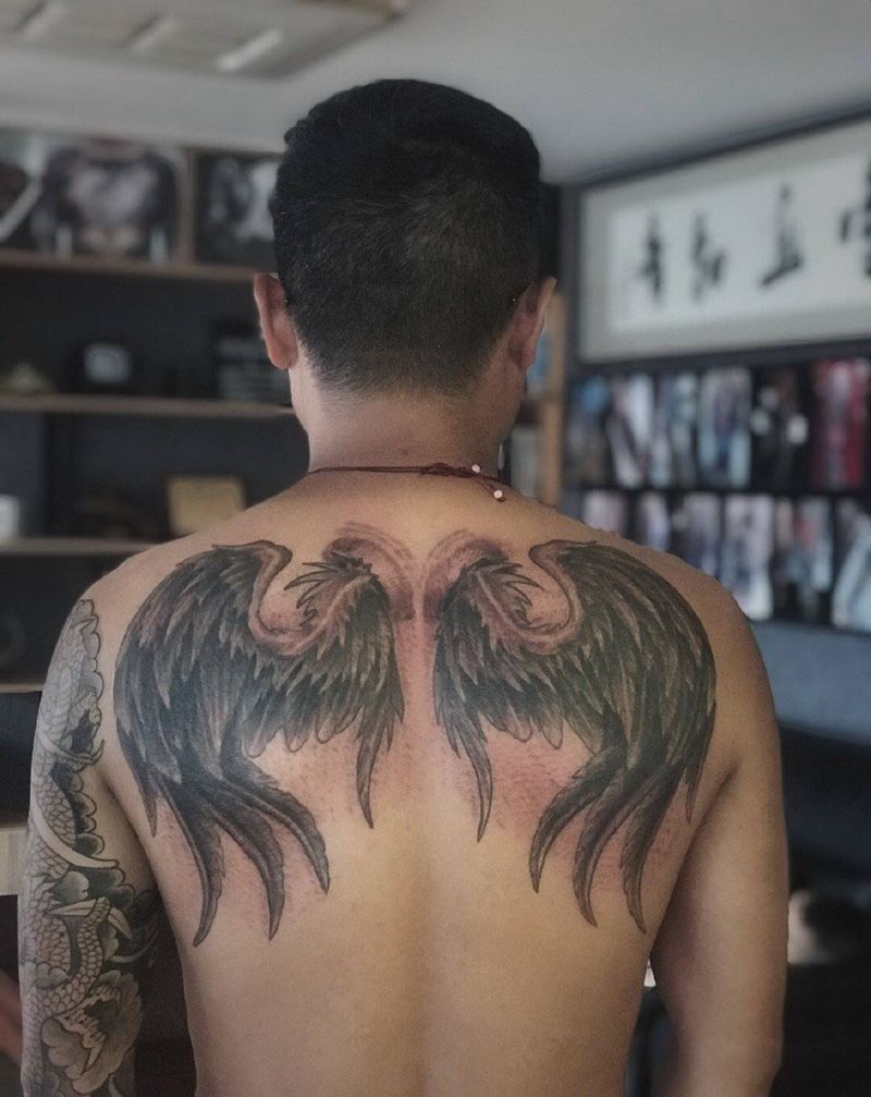 瞳画刺青纹身图片_翅膀纹身图案