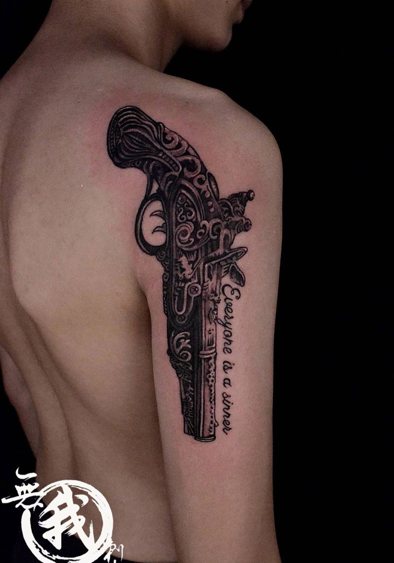 枪纹身图片