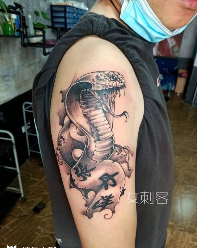 蛇纹身图片_手臂纹身图案
