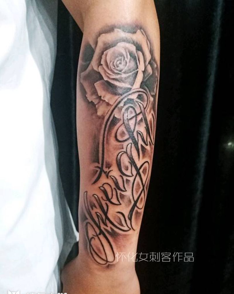 花体纹身图片_手臂花体字纹身图案