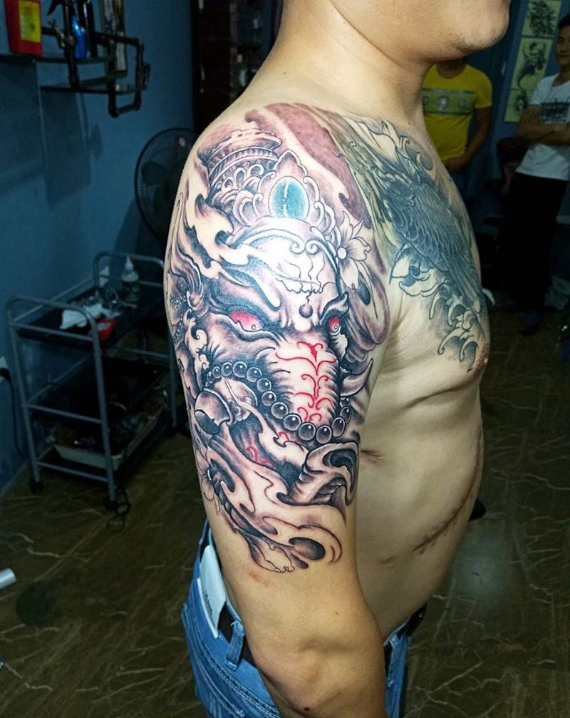 象神纹身图片_手臂传统鬼神纹身图案