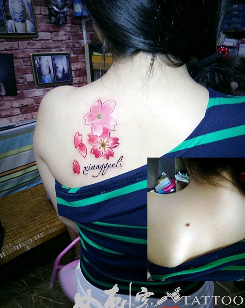 遮黑痣纹身图片