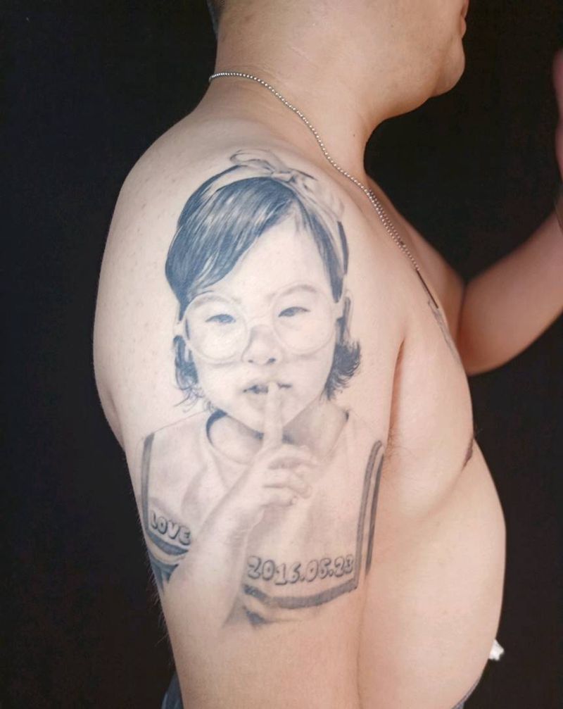 女儿纹身图片_手臂欧美写实肖像纹身图案