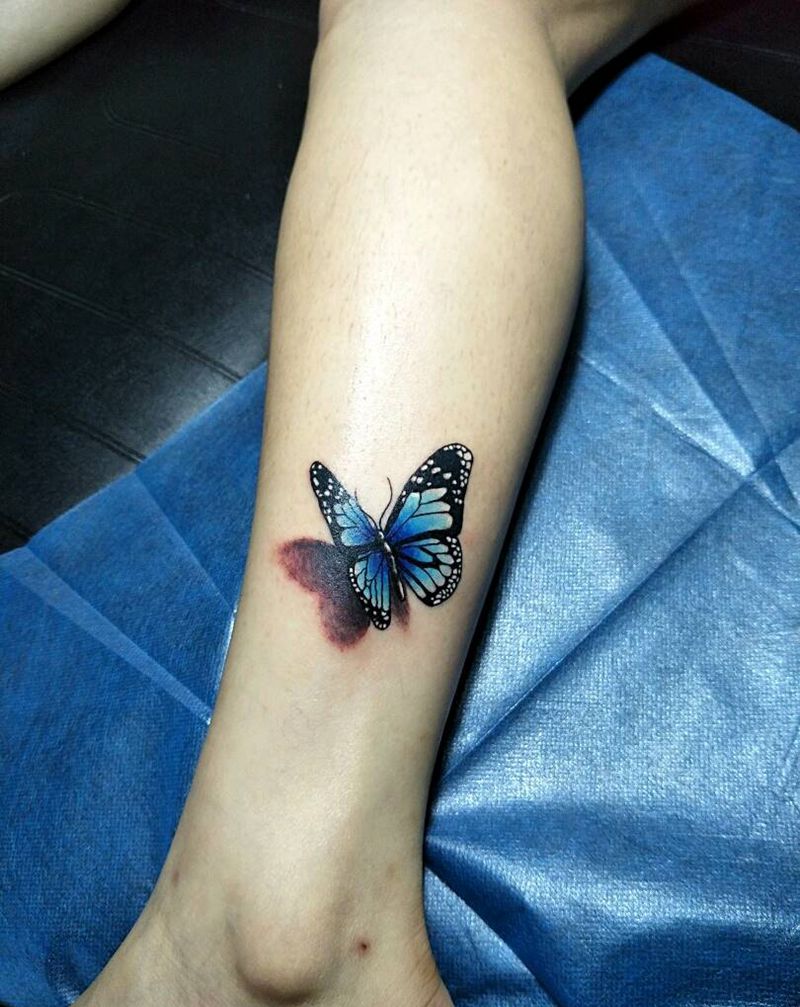 蝴蝶纹身图片_腿部写实动物纹身图案