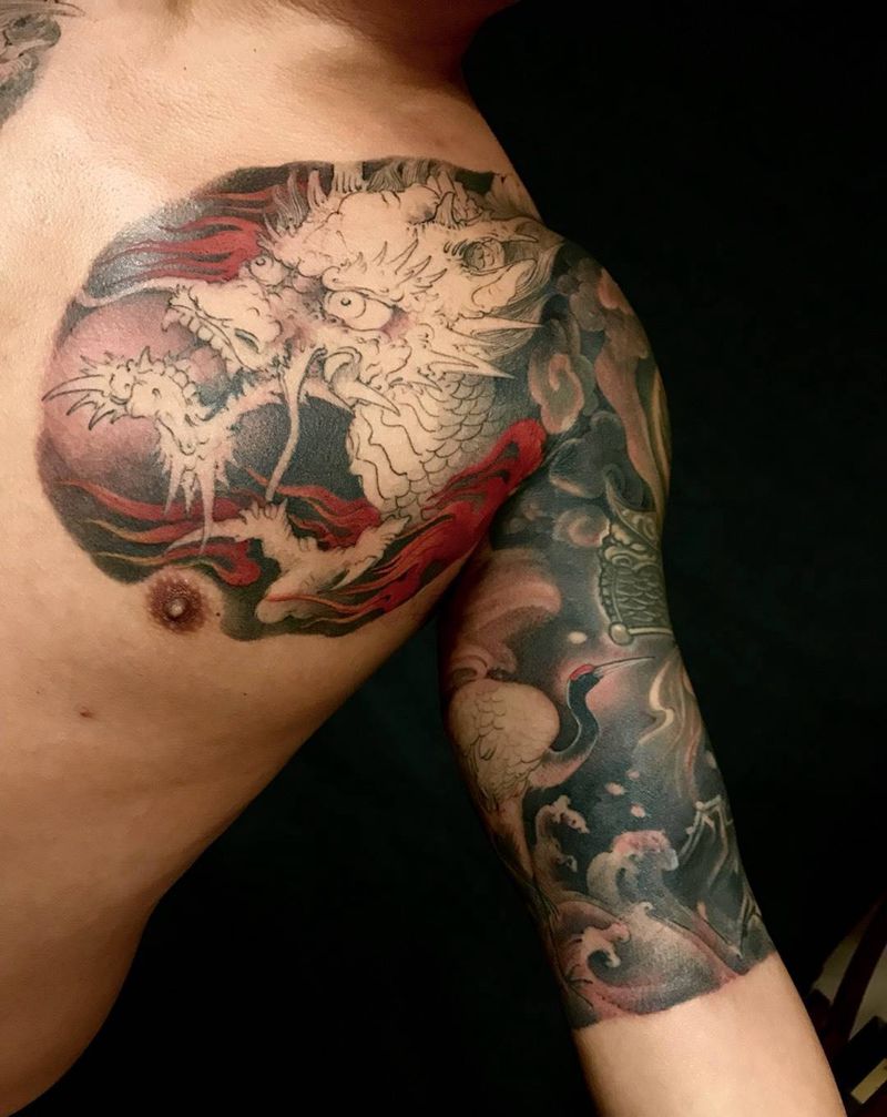 龙与鹤纹身图片_手部传统动物纹身图案