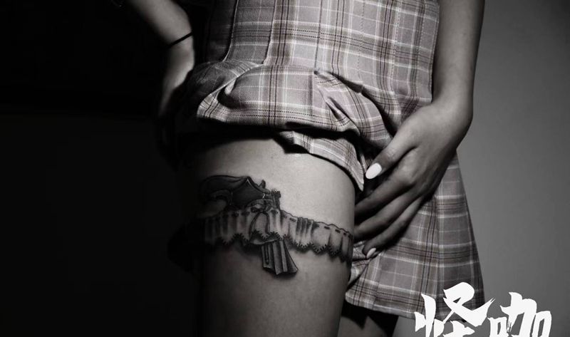 作品纹身图片_腿部枪腿环纹身图案