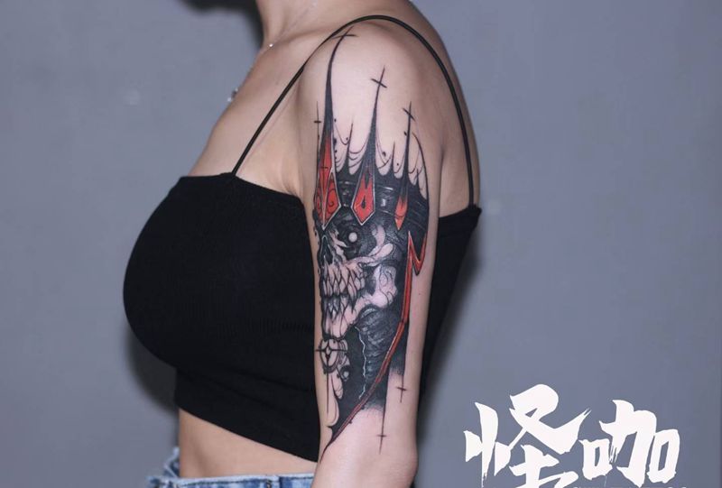 骷髅遮盖纹身图片_手臂肩部欧美写实点刺纹身图案