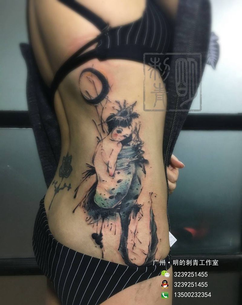 泼墨美人鱼纹身图片