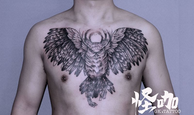 作品纹身图片_胸部点刺纹身图案