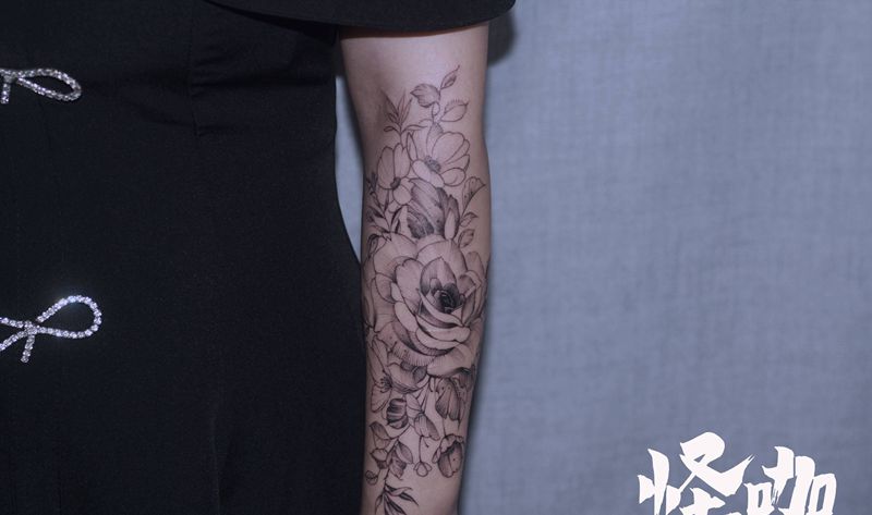 作品纹身图片_手臂点刺纹身图案