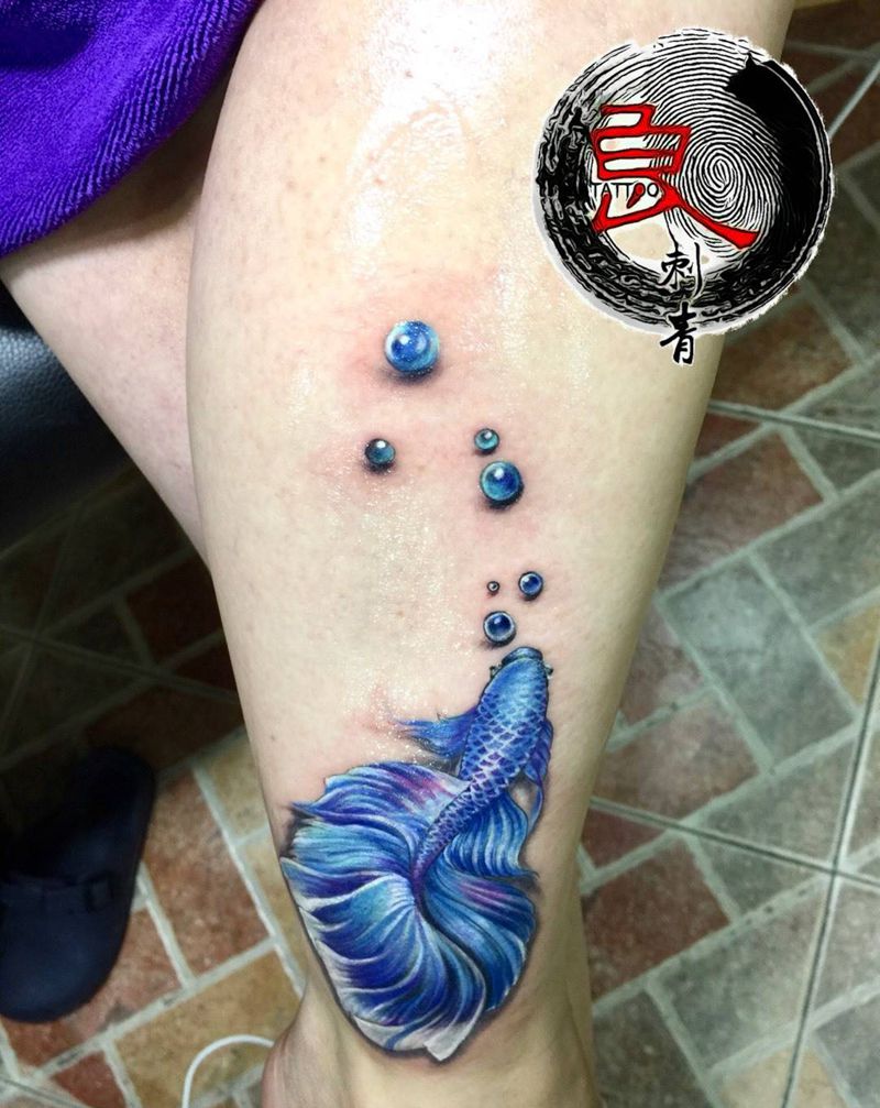 斗鱼纹身图片_腿部欧美写实纹身图案