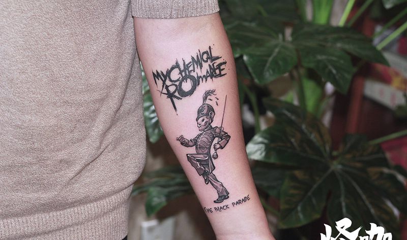 作品纹身图片_手臂点刺纹身图案