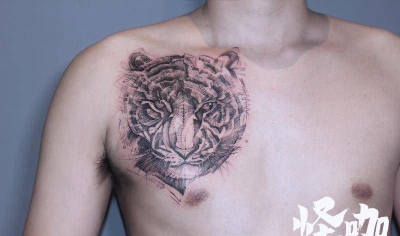 作品纹身图片_胸部点刺纹身图案