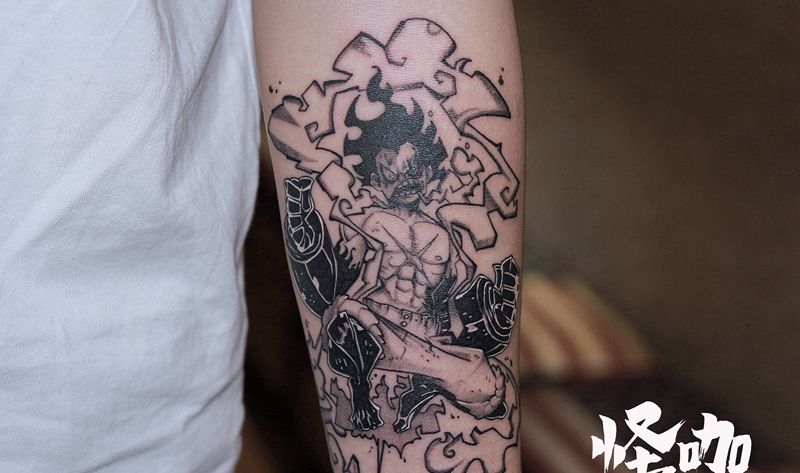 作品纹身图片_手臂点刺纹身图案