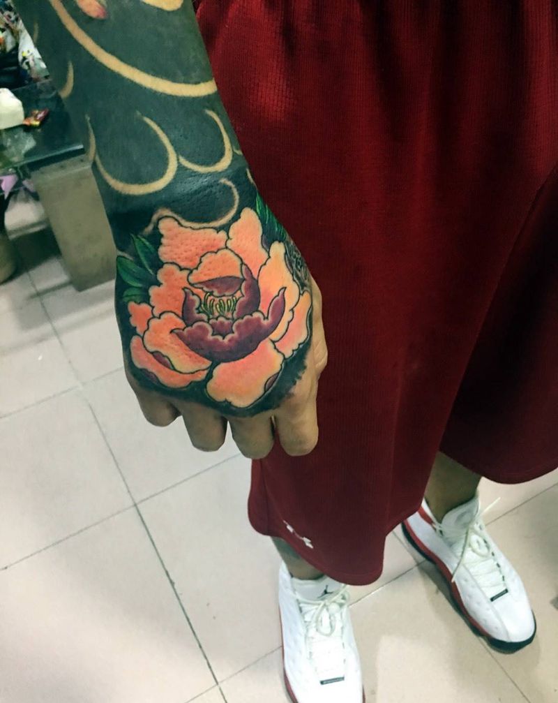 传统牡丹花纹身图片_成品手部传统植物纹身图案